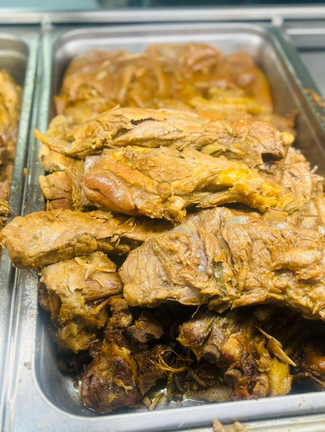 Freshly prepared meats at the hot food counter